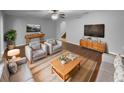 Comfortable living room featuring modern furniture, neutral walls, and ample natural light at 2722 Dodds Ln, Kissimmee, FL 34743
