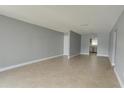 Large living room with a view of the open floor plan and adjacent kitchen at 4205 S Semoran Blvd # 3, Orlando, FL 32822