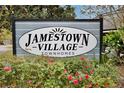 Community sign for Jamestown Village Townhomes with surrounding flowers and landscaping at 713 Saint Matthew Cir, Altamonte Springs, FL 32714