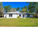 Charming single-story home with a well-maintained lawn and inviting front entrance at 20773 Starry St, Orlando, FL 32833