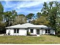 Charming single-story home with well-maintained lawn and beautiful landscaping at 20773 Starry St, Orlando, FL 32833