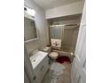 Bathroom featuring shower with sliding glass doors, vanity, and tile flooring at 250 Raintree Dr, Casselberry, FL 32707