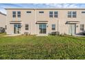 Spacious backyard with lush green grass and sliding glass doors, ideal for outdoor relaxation at 2788 Pierr St, Davenport, FL 33837
