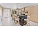 Modern kitchen with a large island, stainless steel appliances, and ample cabinet space at 3191 Brasilia Ave, Kissimmee, FL 34747