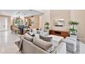 Bright, open concept living room featuring contemporary furniture and décor at 3191 Brasilia Ave, Kissimmee, FL 34747