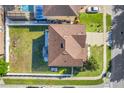 Aerial view of home showing roof, backyard, and proximity to neighbors in a well kept neighborhood at 4655 Ross Lanier Ln, Kissimmee, FL 34758