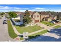 Corner lot home featuring a well-manicured lawn, white picket fence, and an attached garage at 4655 Ross Lanier Ln, Kissimmee, FL 34758