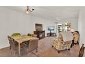 Cozy living room featuring a fireplace and comfortable seating at 325 N Causeway # 2080, New Smyrna Beach, FL 32169