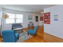 Bright and airy living room with hardwood floors, ample natural light, and built-in shelving for storage and display at 476 Zelda Blvd, Daytona Beach, FL 32118