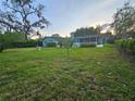Large grassy backyard offering privacy and space, ideal for gardening and outdoor enjoyment at 805 Glen Arden Way, Altamonte Springs, FL 32701
