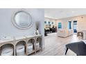 Bright living room with modern decor, light wood floors, and lots of natural light at 13800 Chauvin Ave, Orlando, FL 32827