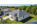 Attractive single-Gathering house with a pristine lawn and a side-entry garage, located in a desirable residential area at 4919 Culdesac Ct, St Cloud, FL 34772