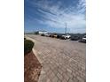 View of the community parking lot with ample parking spaces at 3026 Bella Vista Dr, Davenport, FL 33897