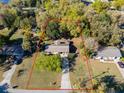 Aerial view of the home showcasing the expansive lot and surrounding greenery at 46 Smyrna Dr, Debary, FL 32713