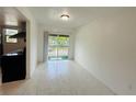 Dining area featuring sliding glass doors and tile flooring at 2751 L B Mcleod Rd # 2751, Orlando, FL 32805