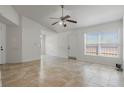 Spacious living room with tile flooring and modern fixtures at 1101 S Thompson Ave, Deland, FL 32720