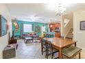 Open-concept floor plan features a living room connected to the kitchen and stairs to the next level at 12862 Strode Ln, Windermere, FL 34786