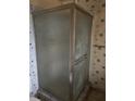 The bathroom features a walk-in shower with blue wallpaper at 209 Whippoorwill Dr, Altamonte Springs, FL 32701
