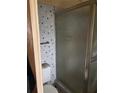 This bathroom features blue tile and shower at 209 Whippoorwill Dr, Altamonte Springs, FL 32701