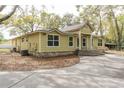 Inviting single-story home with updated brick foundation and freshly painted facade at 2204 Votaw Rd, Apopka, FL 32703