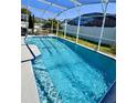 Relaxing screened-in pool area, perfect for enjoying the Florida sunshine at 4618 Prairie Point, Kissimmee, FL 34746