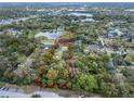 Aerial view of property showcasing lot and surrounding lush greenery at 500 Forest Lake Dr, Altamonte Springs, FL 32714