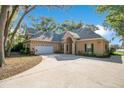 Spacious single-Gathering home with a two-car garage and a wide driveway at 5850 Sheryl Anita St, Oviedo, FL 32765