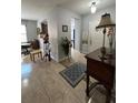 Inviting entryway with tile flooring and decorative accents creating a warm welcome at 3823 Ryegrass St, Clermont, FL 34714