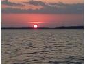 Beautiful sunset view over the water at 3279 Landing Vw, Tavares, FL 32778