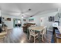 Open-concept living space with modern flooring and sliding glass doors to the patio at 4321 Iveyglen Ave, Orlando, FL 32826