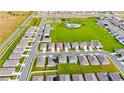Wide aerial shot showcasing the property's location within a Primary-planned community near a community pool at 1811 Silverbell Loop, Haines City, FL 33844