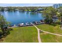 Waterfront condo community with boat docks and brick-lined walkways at 204 Quayside Cir # 501, Maitland, FL 32751