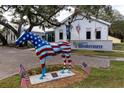 View of Windermere city government building with a patriotic horse statue at the entrance at 2931 Sunbittern Ct, Windermere, FL 34786