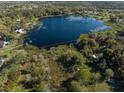 Aerial view of property with lake access at 372 Carpenter Ave, Osteen, FL 32764