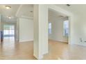 Bright and airy living room features tile floors, neutral walls, and ample natural light at 5029 Southlawn Ave, Orlando, FL 32811