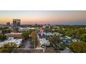 Aerial view showcases the property's location within a vibrant city and lush surroundings at 115 E Concord St # 3, Orlando, FL 32801