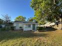 Charming single-story home with green front door and well-maintained landscaping, inviting curb appeal at 508 W Crescent Dr, Lakeland, FL 33805