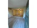 Bright living room showcasing new wood floors, neutral paint, and an open floor plan at 508 W Crescent Dr, Lakeland, FL 33805