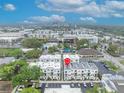 Aerial view of modern townhomes with convenient parking in a vibrant urban neighborhood near downtown at 62 W Jersey St # 13, Orlando, FL 32806