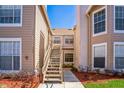 Exterior stairs lead to the residences, highlighting accessibility and design at 645 Stafford Ter # 162, Altamonte Springs, FL 32714