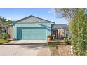 Charming single-story home featuring a two-car garage and well-maintained front yard at 17 Hibiscus Ct, Eustis, FL 32726