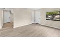 Inviting living room area featuring new floors, neutral walls, and modern fixtures at 226 Noxon St, Auburndale, FL 33823