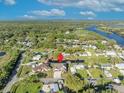 Expansive aerial view of a waterfront property with mature trees and serene surroundings at 2072 Starboard Dr, Geneva, FL 32732