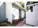 Exterior facade showing a two story home with neutral siding and tidy yard at 2211 Oberlin Ave, Orlando, FL 32804