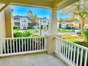 Picturesque porch view overlooking the neighborhood street and well-maintained homes at 9843 Tivoli Villa Dr, Orlando, FL 32829