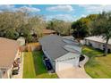 This home features a well-maintained lawn, a paved walkway, and a one-car garage at 3106 Garden Ct, St Cloud, FL 34769