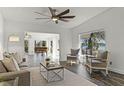 Inviting living room featuring neutral tones, lake views, and plenty of natural light at 801 Springview Dr, Orlando, FL 32803