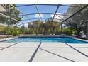 Private in-ground pool with screened enclosure, perfect for year-round enjoyment and relaxation at 5619 Bear Stone Run, Oviedo, FL 32765