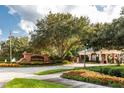 The entrance to Lake Butler Sound is beautifully landscaped and features a charming gatehouse at 6424 Cartmel Ln, Windermere, FL 34786