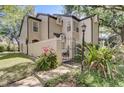 A view of the exterior of this home, highlighting the well-manicured landscaping at 1570 Farrindon Cir, Lake Mary, FL 32746